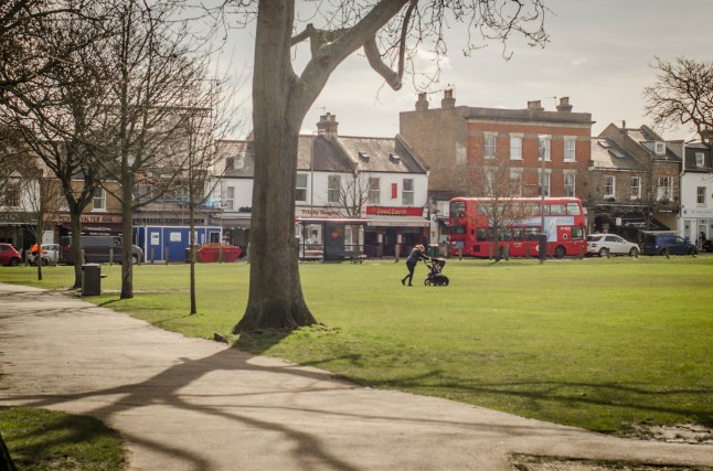 LONDON- MARCH, 2018: View of Bellevue Road from Wandsworth Common. A large open space recreation area next to attractive high street shops, restaurants and cafes in south west London; Shutterstock ID 1051107962; purchase_order: -; job: -; client: -; other: