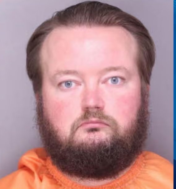 Alexander Lewis, a 32-year-old high school teaching assistant, is charged with disturbing schools and malicious injury to property.(FCSO)