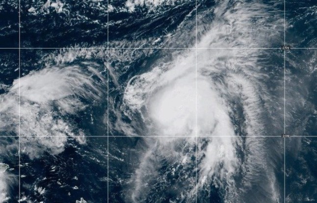 This NOAA satellite image taken at 11:36 a.m. EST on Thursday, Sept. 25, 2025, shows Tropical Storm Humberto in the North Atlantic Ocean. (NOAA via AP)