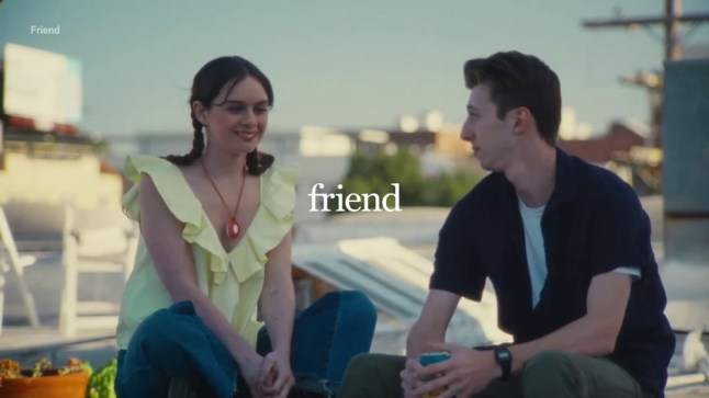 Adverts for ?fake AI friend? you wear as a necklace defaced on subway picture: friend media channel