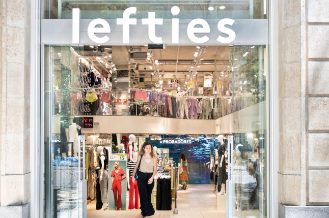 MADRID, SPAIN - 2023/08/21: A woman leaves the Spanish fashion brand owned by Inditex, Lefties, store in Spain. (Photo by Xavi Lopez/SOPA Images/LightRocket via Getty Images)